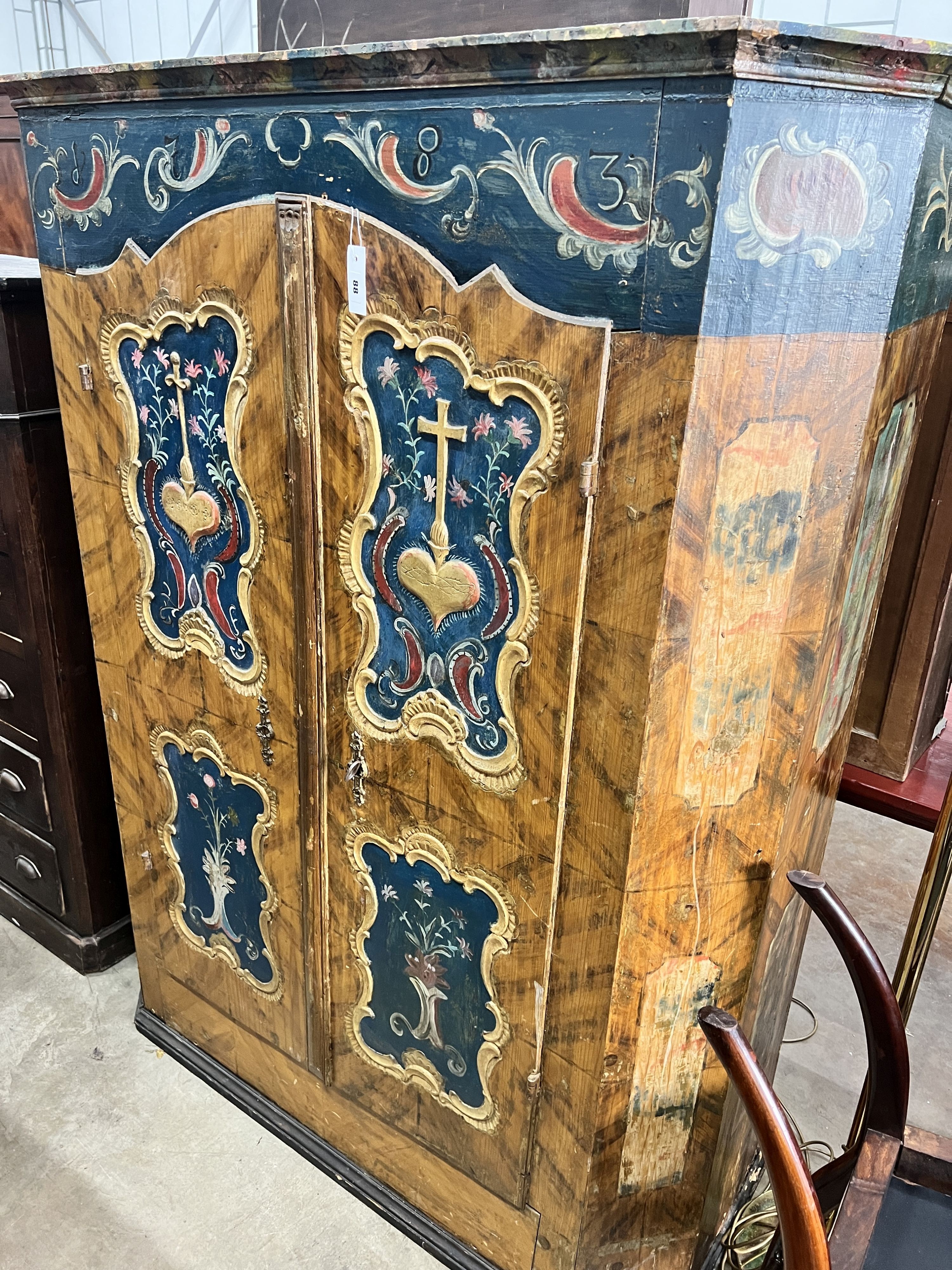 A 19th century Tyrolean painted pine armoire, width 130cm, depth 49cm, height 174cm